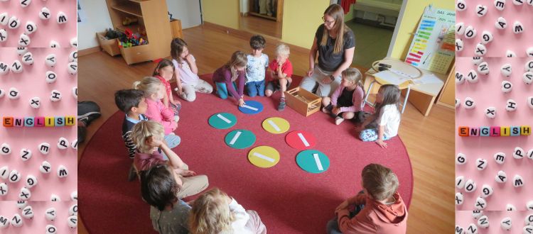 Deutsche Schule Toulouse, Kinder sitzen im Kreis und lernen spielerisch englisch